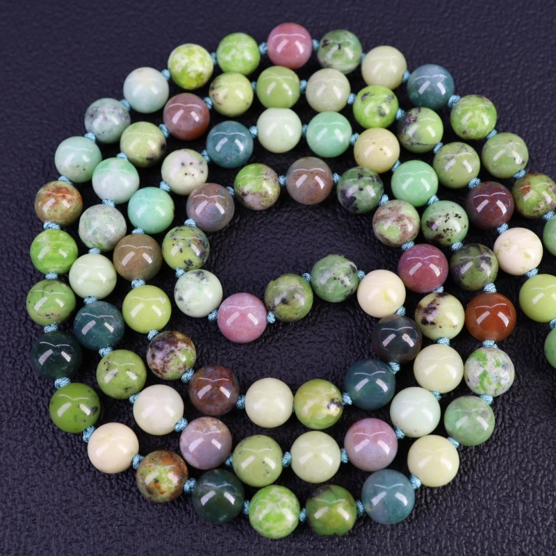 A jewelry maker will use 24 jade beads and 30 teak beads hot sale