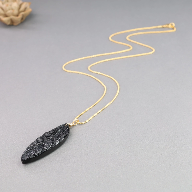 Collana con ciondolo a forma di piuma in acciaio inossidabile